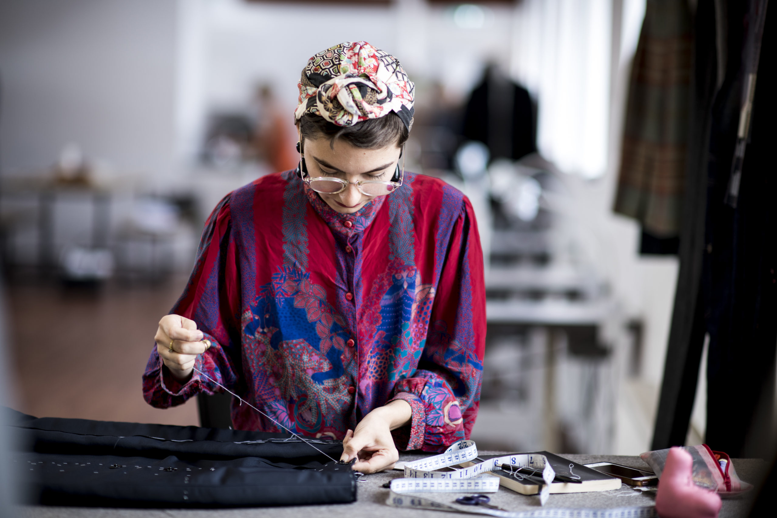 Mimi learning about the secrets of bespoke tailoring