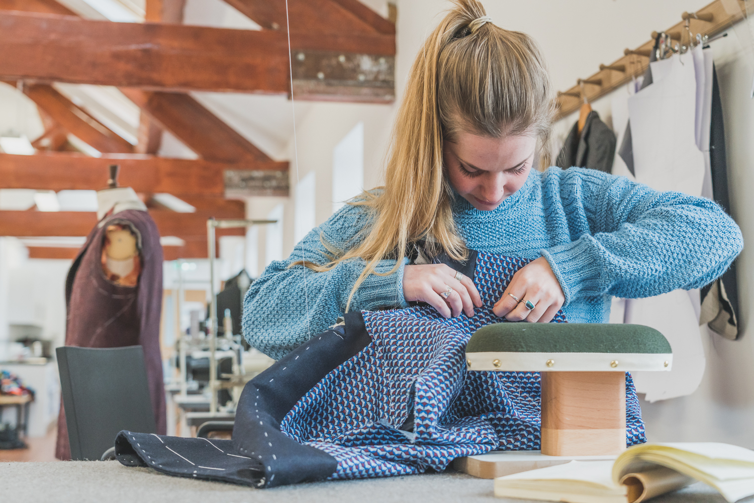 Anna in the process of finishing her bespoke jacket