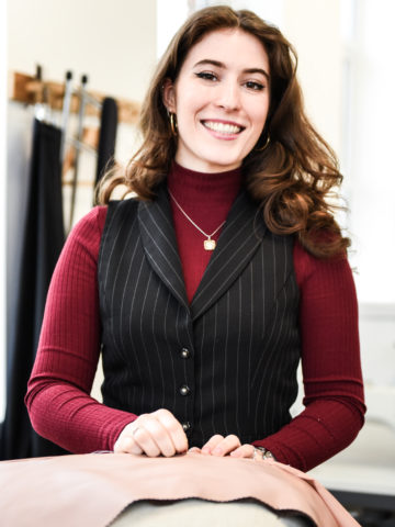 Student participating in a course learning bespoke tailoring